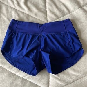 dark blue lululemon speed up low rise 2.5 in